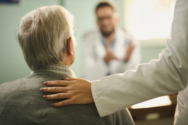 Doctor talking to patient